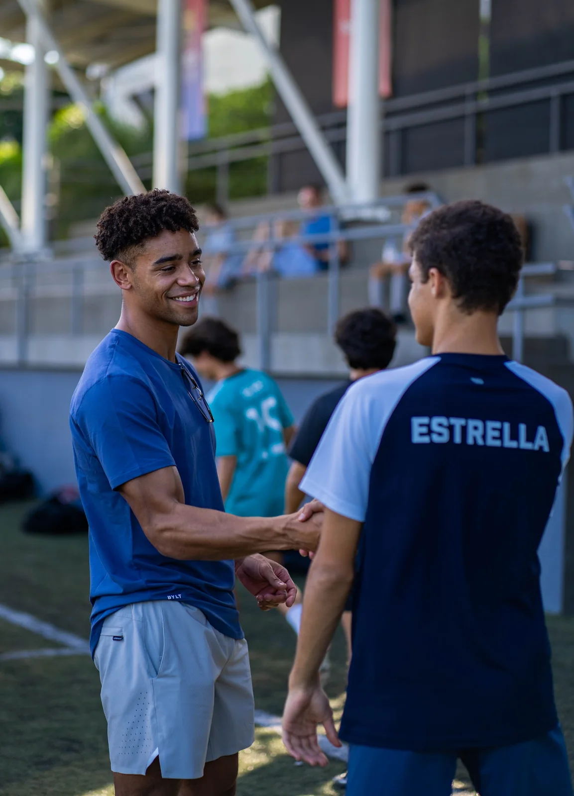 Athletes greeting each other during a group learning day